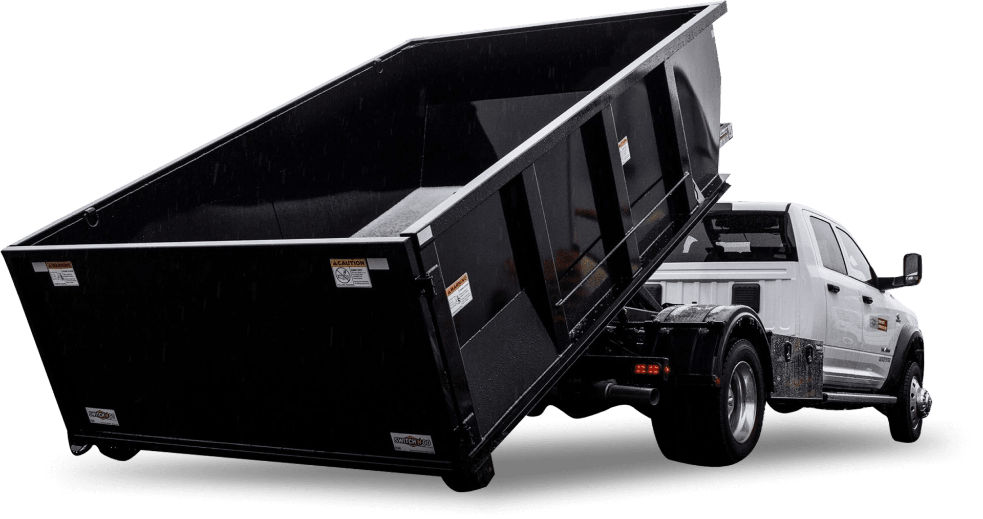 A dump truck with its trailer open.