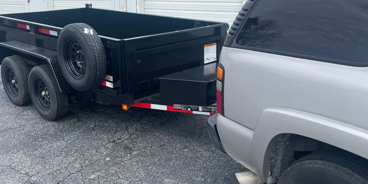 A truck with the back of it and its trailer